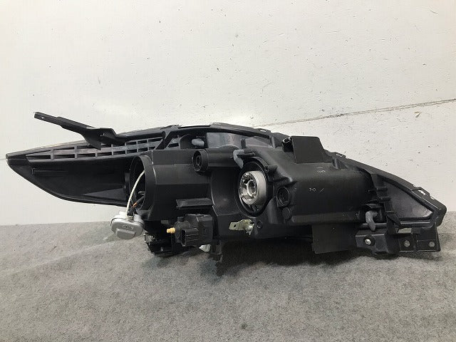 プレマシー CREW/CR3W 純正 中期 左ヘッドライト/ランプ キセノン HID AFS無 レベライザー STANLEY P7696L マツダ(109665)
