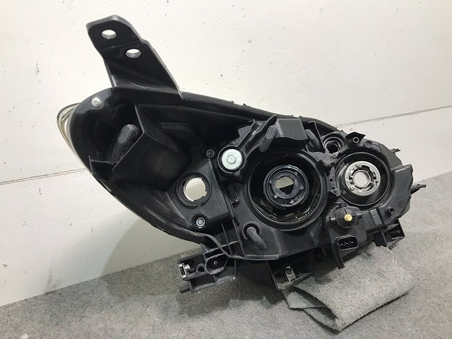 ラフェスタ/プレマシー CWEAWN/CWEFWN/CWEAW/CWEFW 純正 左ヘッドライト/ランプ レベライザー ハロゲン STANLEY P9562 L 日産(104356)