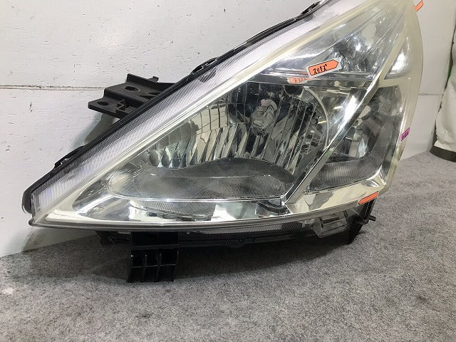 ティアナ J32/PJ32/TNJ32 純正 左 ヘッドライト/ランプ ハロゲン レベライザー KOITO 100-63987 日産(105663)