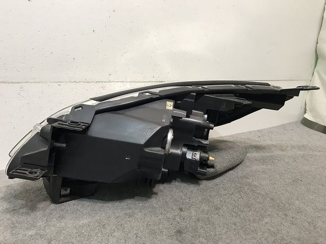 プレマシー/ラフェスタ CW/CWEAW/CWEFW 純正 右ヘッドライト/ランプ ハロゲン レベライザー STANLEY P9562R マツダ(106596)