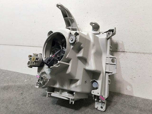 ムーヴコンテ カスタム L575S/L585S 純正 左ヘッドライト/ランプ ハロゲン レベライザー KOITO 100-51966 ダイハツ(106999)