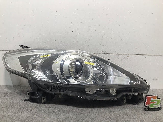 プレマシー CREW/CR3W 純正 後期 右ヘッドライト/ランプ キセノン HID レベライザー STANLEY P7696 マツダ(108287)