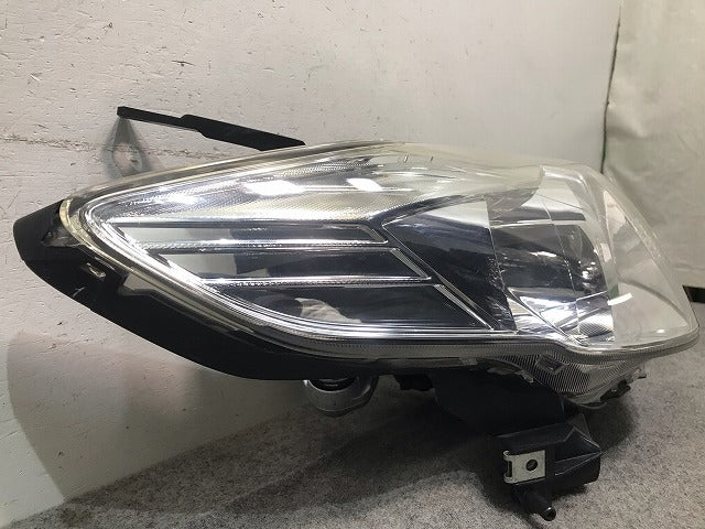 プレマシー CREW/CR3W 純正 後期 右ヘッドライト/ランプ キセノン HID レベライザー STANLEY P7696R マツダ(109583)
