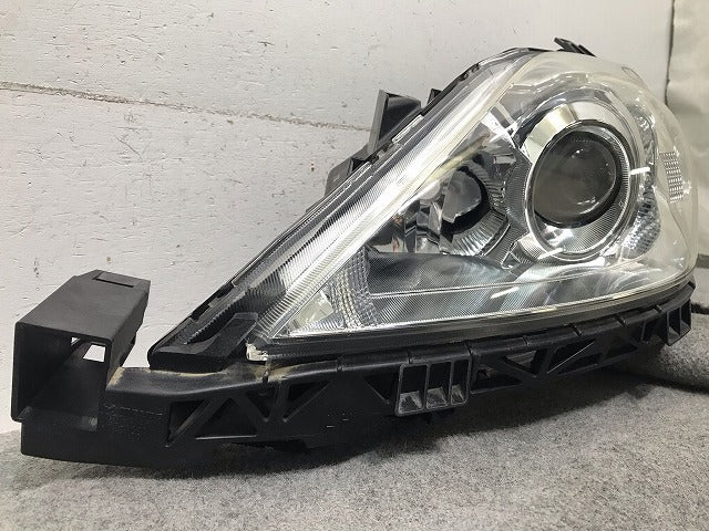 プレマシー CREW/CR3W 純正 左ヘッドライト/ランプ ハロゲン STANLEY P7137L マツダ(109656)