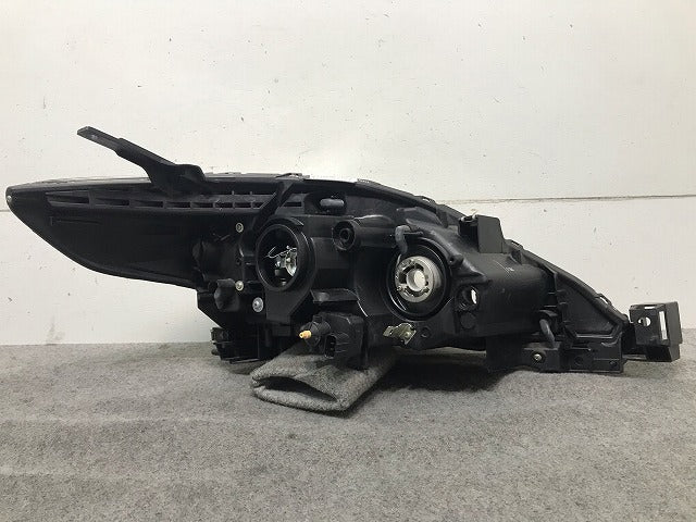 プレマシー CREW/CR3W 純正 左ヘッドライト/ランプ ハロゲン STANLEY P7137L マツダ(109656)