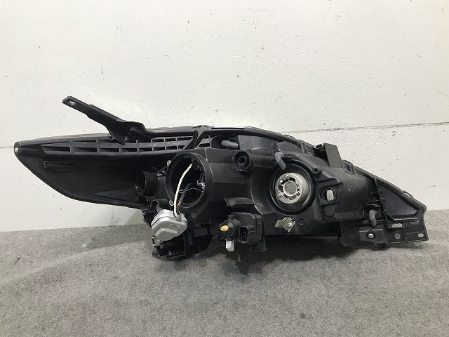 プレマシー CREW/CR3W 純正 中期 左ヘッドライト/ランプ キセノン HID AFS無 レベライザー STANLEY P7696L マツダ(109665)