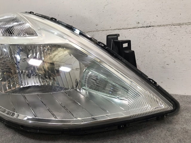 ティーダ C11/JC11/NC11 純正 右ヘッドライト/ランプ ハロゲン レベライザー STANLEY P7779 日産(111027)