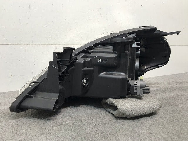 ティーダ C11/JC11/NC11 純正 右ヘッドライト/ランプ ハロゲン レベライザー STANLEY P7779 日産(111027)