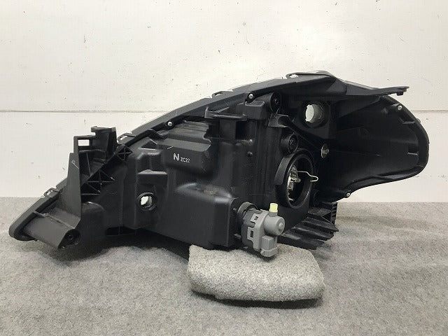 ティーダ C11/JC11/NC11 純正 右ヘッドライト/ランプ ハロゲン レベライザー STANLEY P7779 日産(111027)