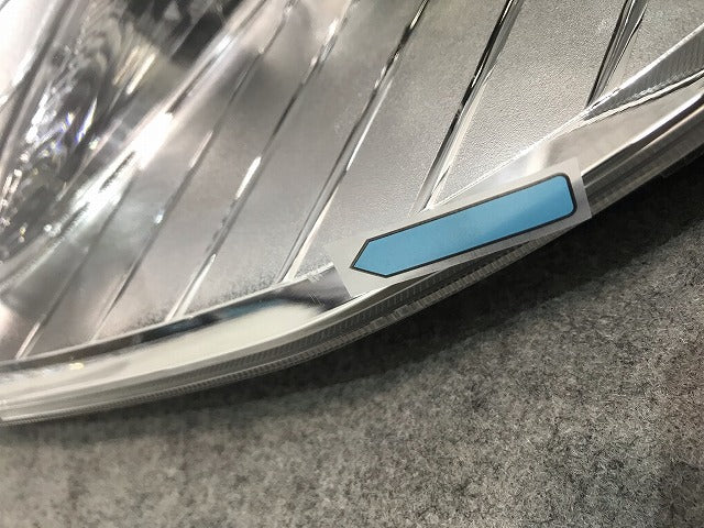 ティーダ/TIIDA C11/JC11/NC11 純正 後期 左ヘッドライト/ランプ レベライザーハロゲン付 STANLEY P7779 日産/NISSAN (111557)
