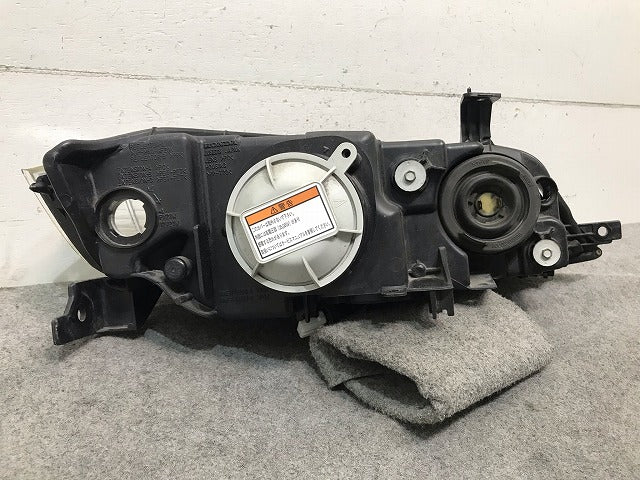 オデッセイ/RB1/RB2 純正 左ヘッドライト/ランプ  キセノン HID レベライザー付 刻印J   KOITO 100-22497 ホンダ (112270)