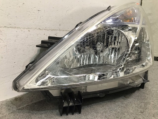 ティアナ J32/PJ32/TNJ32 純正 左ヘッドライト/ランプ レベライザーハロゲン 刻印A KOITO 100-63987 日産(114095)