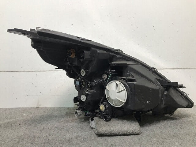 ティアナ J32/PJ32/TNJ32 純正 左ヘッドライト/ランプ レベライザーハロゲン 刻印A KOITO 100-63987 日産(114095)