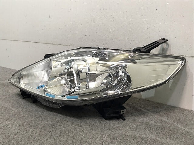プレマシー CREW/CR3W 純正 前期 左ヘッドライト/ランプ キセノン HID レベライザー STANLEY P5104L マツダ (114820)