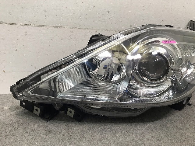 プレマシー CREW/CR3W 純正 左ヘッドライト/ランプ キセノン HID レベライザー STANLEY P5104 マツダ (114850)