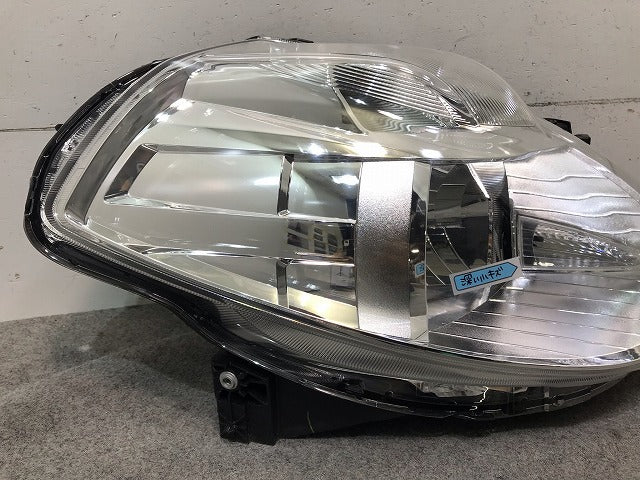 ティーダ C11/JC11/NC11 純正 後期 右ヘッドライト/ランプ ハロゲン レベライザー 刻印E STANLEY P7779 日産 (115482)
