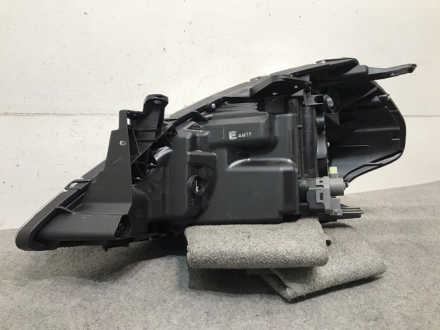 ティーダ C11/JC11/NC11 純正 後期 右ヘッドライト/ランプ ハロゲン レベライザー 刻印E STANLEY P7779 日産 (115482)