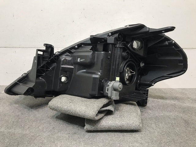 ティーダ C11/JC11/NC11 純正 後期 右ヘッドライト/ランプ ハロゲン レベライザー 刻印E STANLEY P7779 日産 (115482)