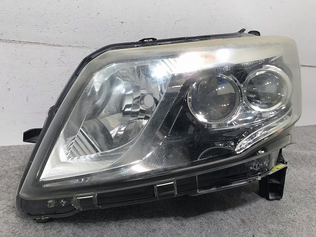 ムーヴカスタム LA100S/LA110S 純正 後期 左ヘッドライト/ランプ LED レベライザー KOITO 100-51094 81185-B2010 ダイハツ (116036)