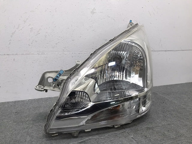 ムーヴ/LA100S/LA110S 純正 前期 左ヘッドライト/ランプ ハロゲン レベライザー 刻印ラ STANLEY P9501 ダイハツ (119336)