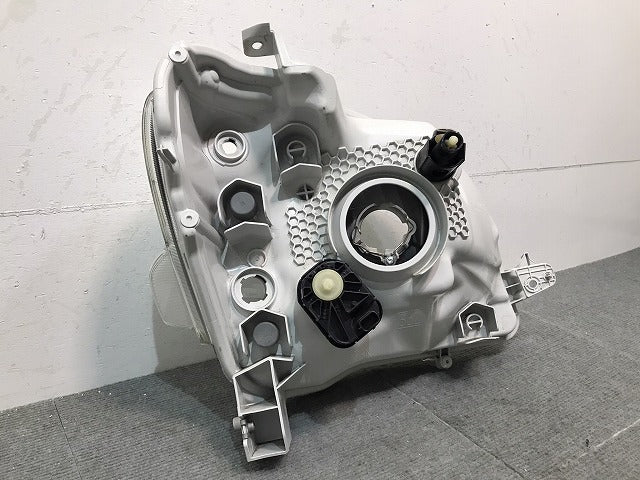 タント/シフォン/LA600S/LA610S/LA600F/LA610F 純正 左ヘッドライト ハロゲン レベライザー 刻印T ICHIKOH 1880/81150-B2770 (121296)