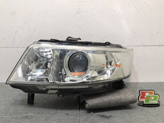 ワゴンＲ／スティングレ－／ＭＨ２３　純正　左ヘッドライト／ランプ　キセノン　ＨＩＤ　レベライザー　１００－５９１９１（１２２４３６