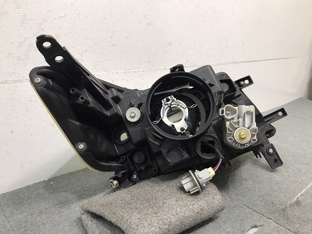 ワゴンＲ／スティングレ－／ＭＨ２３　純正　左ヘッドライト／ランプ　キセノン　ＨＩＤ　レベライザー　１００－５９１９１（１２２４３６