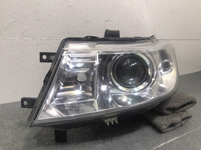ワゴンR/スティングレ- MH23S 純正 左ヘッドライト/ランプ キセノン HID レベライザー KOITO 100-59191 スズキ(124100)