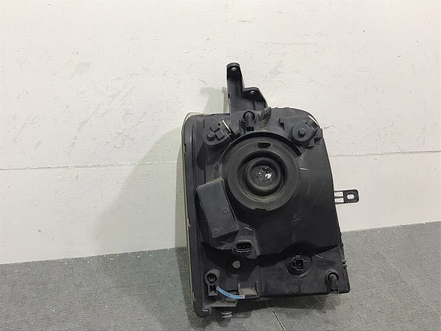 エブリィ/クリッパー/スクラム/ミニキャブ DA64V/NV100/DR64V/DG64V/DS64V 純正 左ヘッドライト ハロゲン レベライザー LE04G6129(124330)