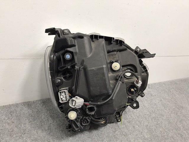 ムーヴ/キャンバス/キャンパス LA800S/LA810S 純正 左 ヘッドライト/ランプ LED レベライザー 刻印8L KOITO 100-69038 ダイハツ(127981)