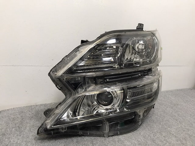 ヴェルファイア 20系/ANH20W/GGH20W/ANH25W/GGH25W 純正 左 ヘッドライト キセノン HID レベライザー 刻印サ ICHIKOH 58-23 トヨタ(128191)