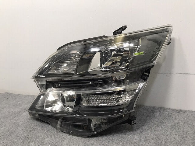ヴェルファイア 20系/ANH20W/GGH20W/ANH25W/GGH25W 純正 左 ヘッドライト キセノン HID レベライザー 刻印サ ICHIKOH 58-23 トヨタ(128191)
