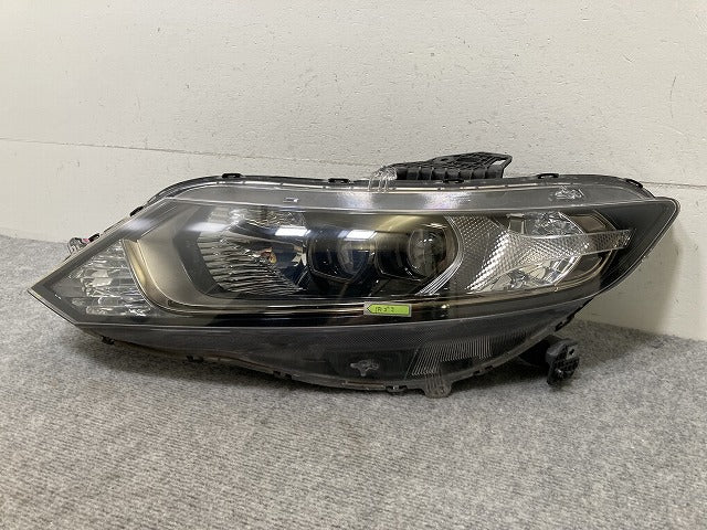 ジェイド FR4/FR5 純正 前期 左 ヘッドライト/ランプ ハロゲン レベライザー 刻印J1 STANLEY W2345 ホンダ(135382)