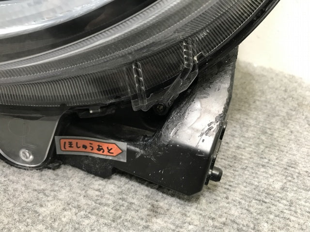ワゴンR/スマイル/ハイブリッド/X MX91S 純正 左 ヘッドライト/ランプ LED レベライザー 刻印TL STANLEY W6079 スズキ(136514)