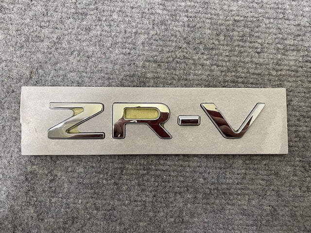 新車取り外し!ZR-V/ZRV e:HEV RZ3/RZ4/RZ5/RZ6 純正 エンブレム/オーナメント 75701-TPG-A000 シルバー メタリック ホンダ(139772)