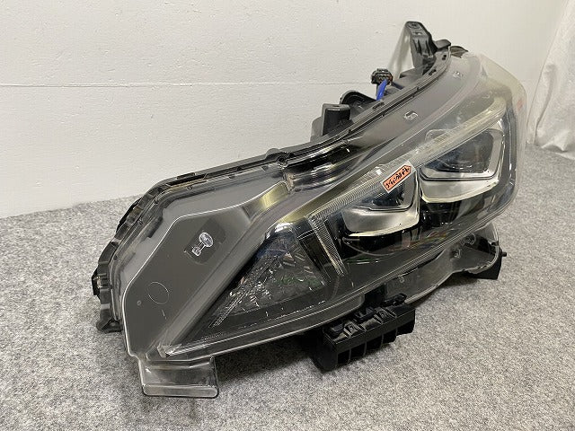 リーフ/LEAF ZE1 純正 前期 左 ヘッドライト/ランプ レベライザーLED 刻印P ICHIKOH 1954/26060 5SK5A 26075-5SK5B 日産(141286)