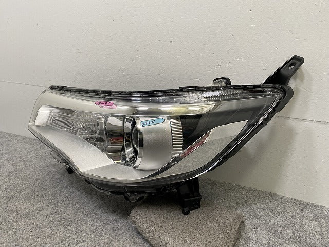 デイズ ハイウェイスター B21W 純正 左 ヘッドライト/ランプ レベライザーキセノン HID STANLEY W1048 日産(141938)
