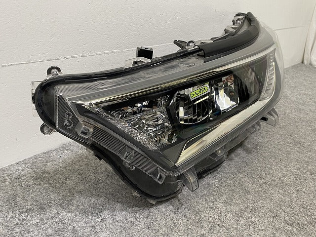RAV4 ラブ4 MXAA52/MXAA54/AXAH52/AXAH54 純正 左 ヘッドライト/ランプ レベライザーLED 刻印E STANLEY 42-90 81185-42882 トヨタ(142699)