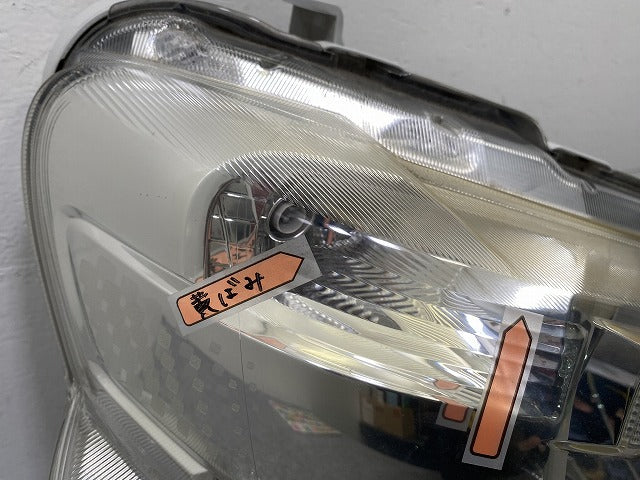 タント LA600S/LA610S 純正 右 ヘッドライト/ランプ レベライザーハロゲン ICHIKOH 1880 ダイハツ(143202)