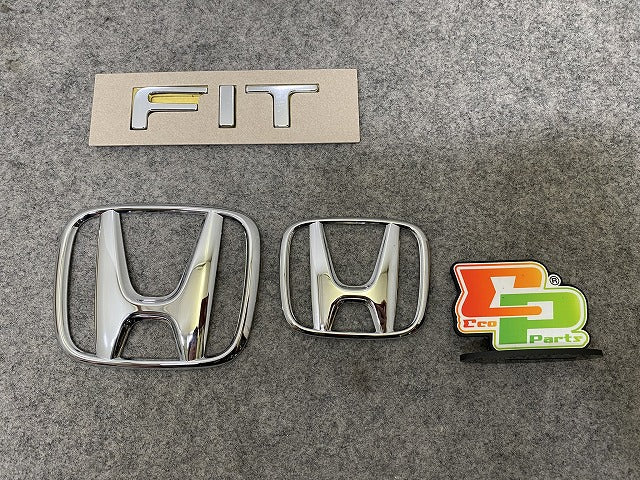 新車取り外し!フィット GR1/GR2/GR3/GR4/GR5/GR6/GR7/GR8 GS4/GS5/GS6/GS7 純正  エンブレム/オーナメント 75700-TA0-A000 ホンダ(144382)