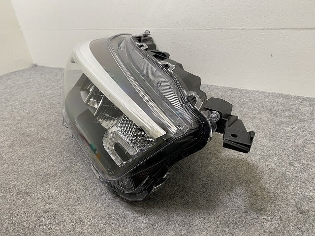 ライズ/ロッキー/レックス A200/A210/A201/A202/A/S/F 純正 右 ヘッドライト/ランプ LED レベライザー ICHIKOH 1990 81110-B1700(144459)