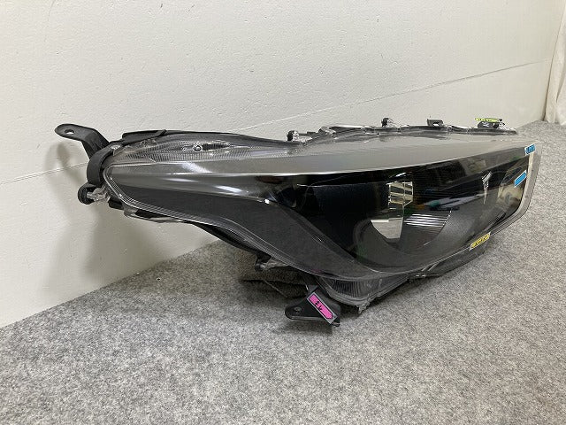 ヤリス KSP210/MXPA10/MXPA15 ハイブリッド/MXPH10/MXPH15 MXPH14/MXPH17 純正 右 ヘッドライト レベライザーハロゲン 刻印A5 K0-1(144673)