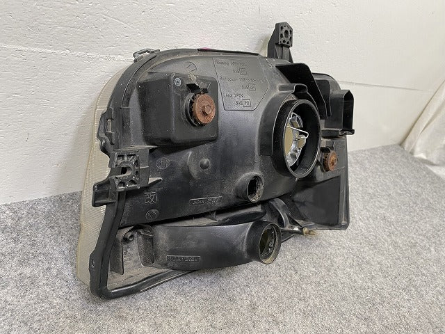 キャリイ トラック DA62T/DA52T 純正 右 ヘッドライト/ランプ ハロゲン KOITO 100-32624 スズキ(144764)