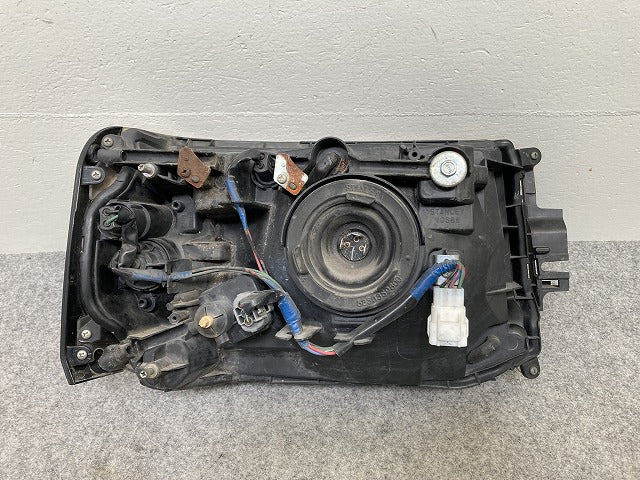 ミニキャブ/クリッパー U61T/U62T/U61V/U62V/U71V/U72V 純正 後期 左 ヘッドライト/ランプ ハロゲン 刻印A STANLEY W0736 L(145107)