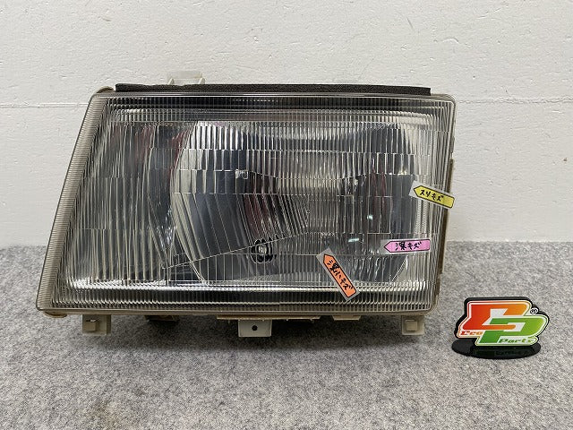 キャンター FE7.8型/2002-2011/標準 純正 左 ヘッドライト/ランプ レベライザーハロゲン KOITO 100-87554 三菱ふそう(146036)