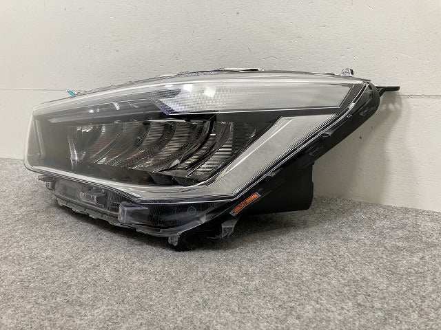 ライズ/ロッキー/レックス A200/A210/A201/A202/A/S/F 純正 左 ヘッドライト/ランプ レベライザーLED ICHIKOH 1991 81150-B1710(146302)