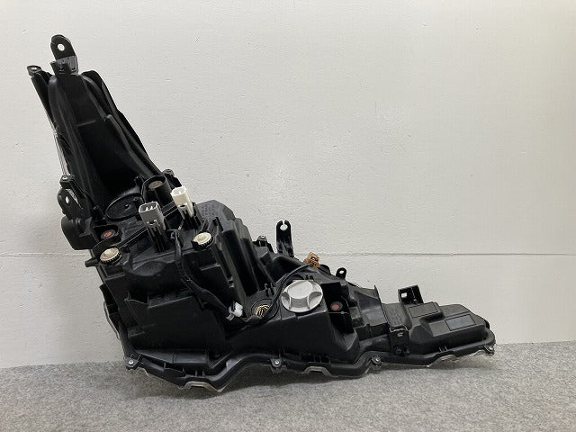 カローラ スポーツ 210系/NRE210H/NRE214H/ZWE211H/ZWE213H/ZWE219H/MZEA12H 純正 左 ヘッドライト/ランプ レベライザーLED 刻印B(146584)