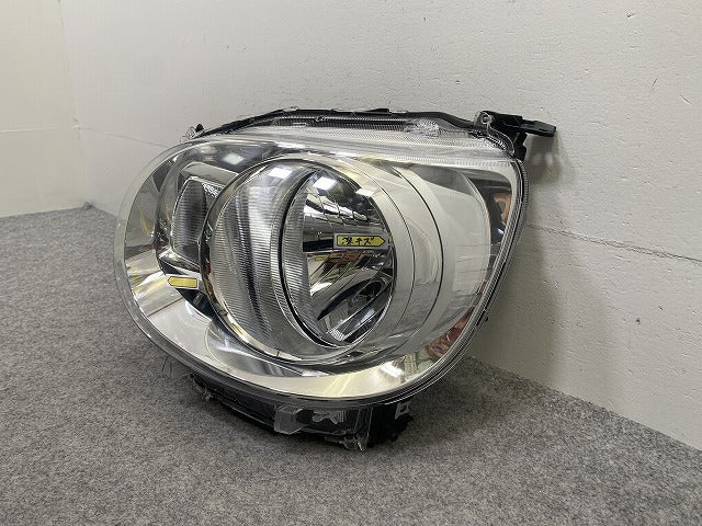 ムーヴ キャンバス/キャンパス LA800S/LA810S 純正 左 ヘッドライト/ランプ ハロゲン レベライザー 刻印5H KOITO 100-69039(147558)