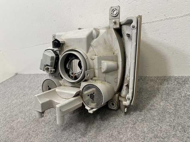 エルフ 6代目/2006- 純正 右 ヘッドライト/ランプ ハロゲン レベライザー 刻印24V KOITO 110-21873 いすゞ(147598)