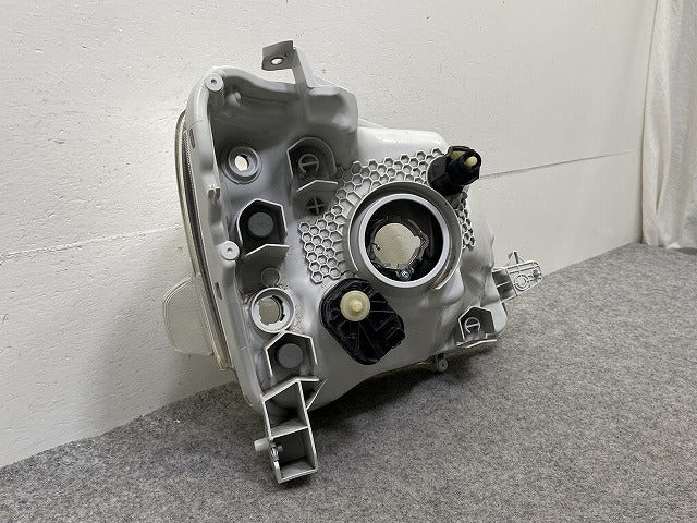 タント LA600S/LA610S 純正 左 ヘッドライト/ランプ ハロゲン レベライザー ICHIKOH 1880 81170-B2540 ダイハツ(147976)